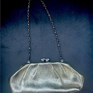 Beautiful gold Brighton clutch purse with chain. Jeweled heart clasps!